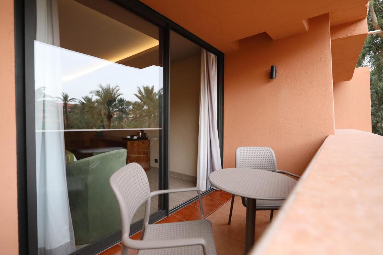 Hotel Kenzi Rose Garden Marrakesch Exterior foto A balcony at the hotel